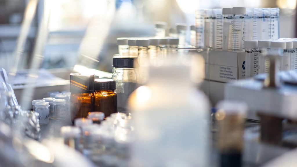 bottles of medicine are lined up on a table